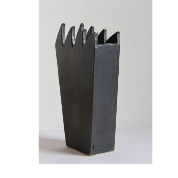 Very 1980s - 90s shapes. Monogram fe stamp on the side.Spiked vase by Fernand Everaert The spiked rim to resemble shark teeth, spikes or the simpsons hair.