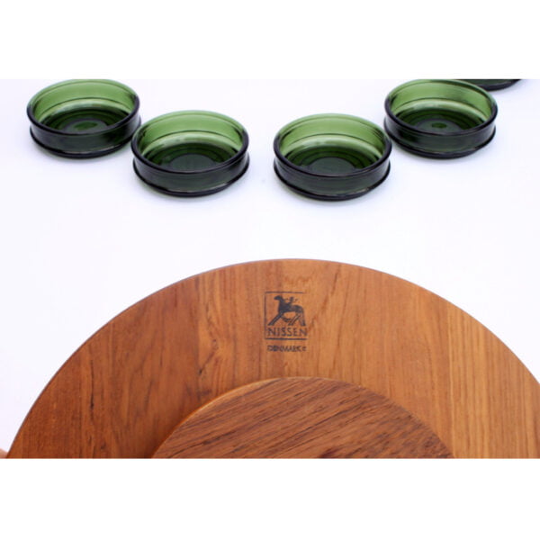 Teak wooden "lazy susan" serving tray with five green glass bowls. Designed by richard nissen, denmark 1960s. Round wooden Scandinavian snack or sauce serving set with a castiron handle that holds five green bowls. It rotates hence the name "lazy susan", you can bring the sauce or snack to your side without getting up from your chair or having to pass the bowl. Century soup vintage design antiques curiosa collectibles antwerp.