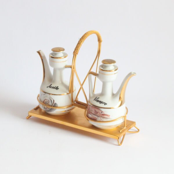 A Spanish “Aceite y vinagre” or oil and vinegar or condiment serving set in porcelain with a gold coloured metal holder. Both serving pots are shaped like a teapot, one has an oyster decoration and one a lobster | Century Soup |