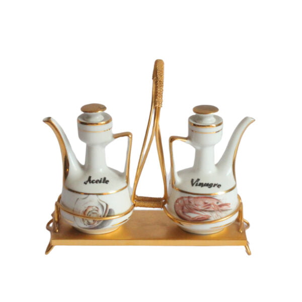 A Spanish “Aceite y vinagre” or oil and vinegar or condiment serving set in porcelain with a gold coloured metal holder. Both serving pots are shaped like a teapot, one has an oyster decoration and one a lobster | Century Soup |
