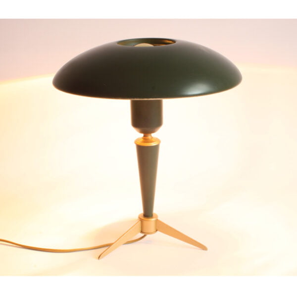1950s desk lamp with brass tripod feet and green UFO shade.