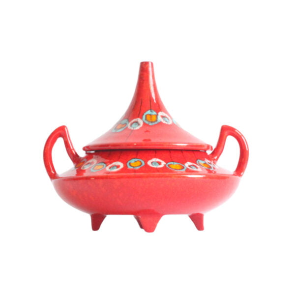 Red ceramic bonbonnière or biscuit box with a pointy "hat shaped" lid and devil horn shaped handles. Front view.