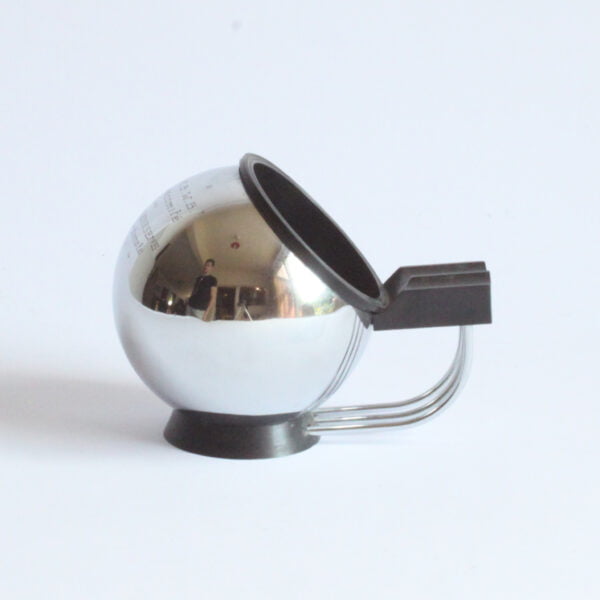 A chrome ball, bakelite base, three steel wires hold the cigarettes. Art deco ball ashtray by Demeyere Belgium.
