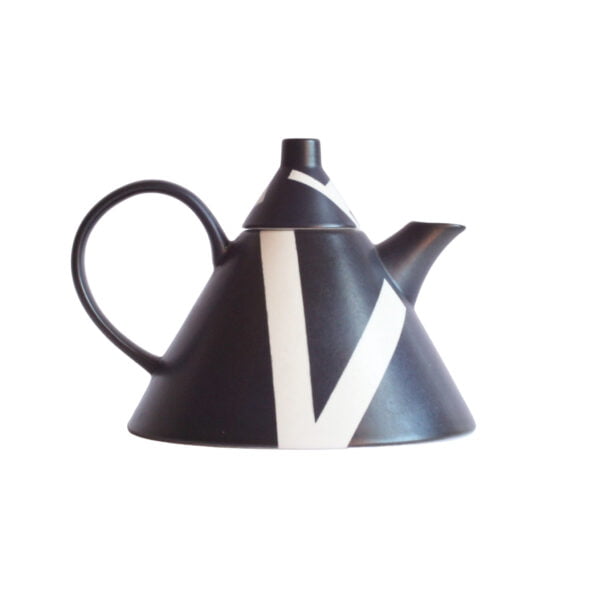 Memphis style teapot by rolf sinnemark for rörstrand, sweden 1985. Model 411, a conical shaped porcelain teapot in black. Seemingly rand placed white geometrical shapes cover the surface | Century Soup |