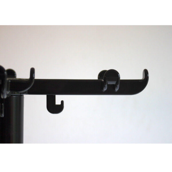 Cylindrical coat rack with a cylindrical umbrella stand bin at the base, a cross shaped base and a cross shaped coat hanger with several hooks at the top. Designed by Ettore Sottsass for Olivetti.