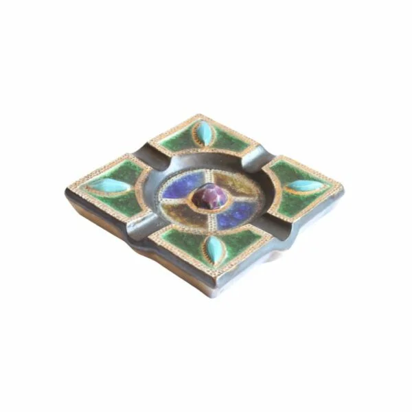 Vintage art deco square stoneware ashtray in gres de guerin with blue gemstones in the corners crackle glass inlays in blue, green and yellow. In the middle sits a large purple ceramic "gemstone". Very medieval magical forest fairy tale vibes. Century Soup vintage design.
