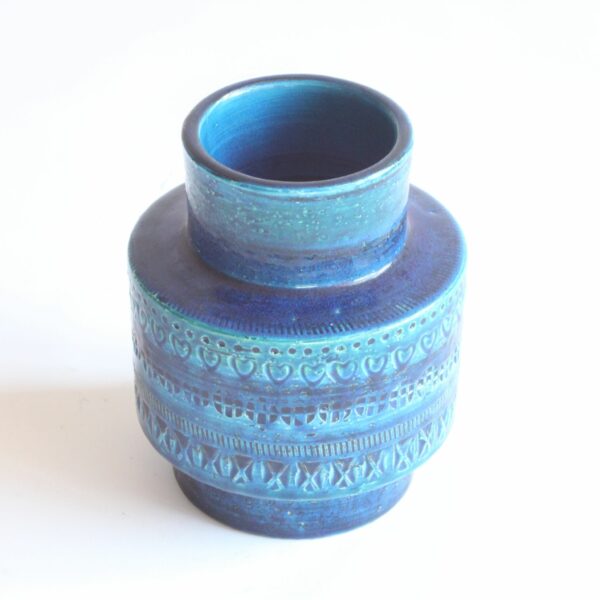 A vintage mid century blue ceramic vase by Aldo Londi for Bitossi, Italy 1960s. Cylindrical shape with a smaller radius at the base and at the top. In the typical Rimini blue | Century Soup |