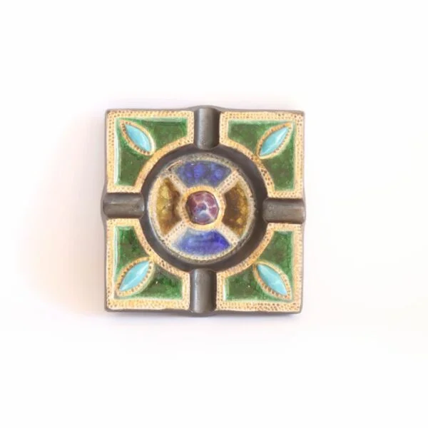 Vintage art deco square stoneware ashtray in gres de guerin with blue gemstones in the corners crackle glass inlays in blue, green and yellow. In the middle sits a large purple ceramic "gemstone". Very medieval magical forest fairy tale vibes. Century Soup vintage design.
