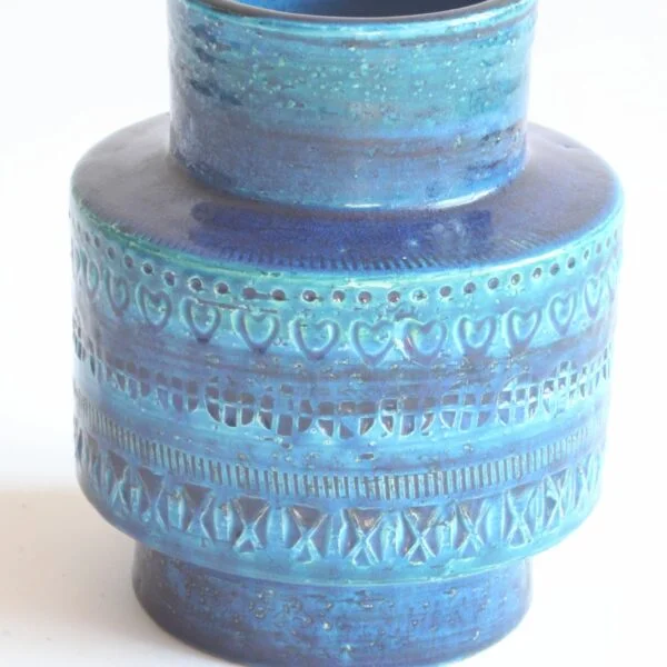 A vintage mid century blue ceramic vase by Aldo Londi for Bitossi, Italy 1960s. Cylindrical shape with a smaller radius at the base and at the top. In the typical Rimini blue | Century Soup |