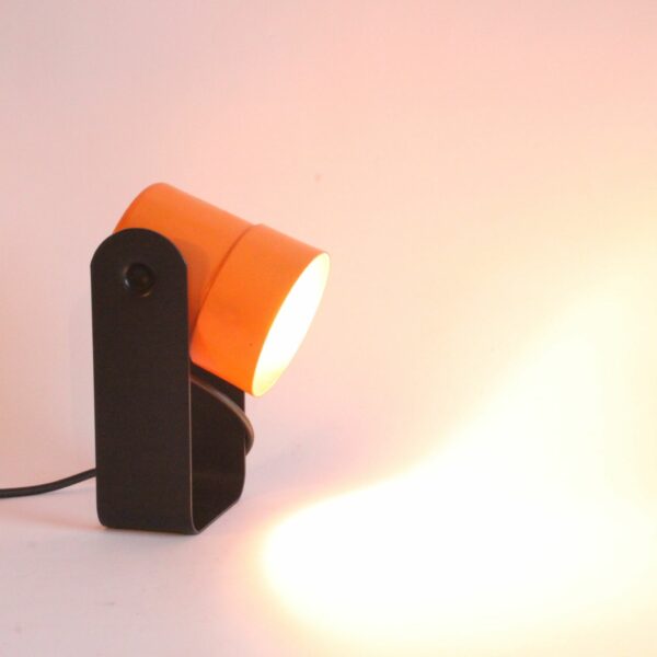 Orange and black table or wall spotlight lamp by Karl Lang for SIS Leuchten, Germany 1976. Model 881, won a I.F. or "internation forum" award in 1976 | Century Soup |