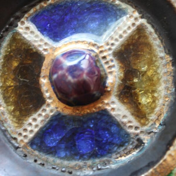 Vintage art deco square stoneware ashtray in gres de guerin with blue gemstones in the corners crackle glass inlays in blue, green and yellow. In the middle sits a large purple ceramic "gemstone". Very medieval magical forest fairy tale vibes. Century Soup vintage design.