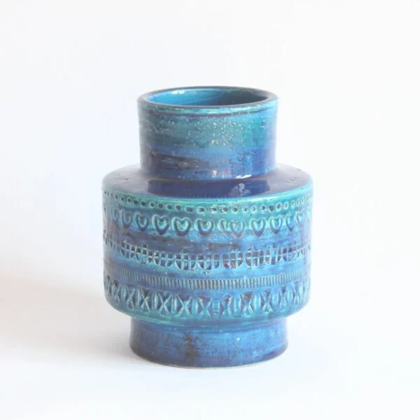 A vintage mid century blue ceramic vase by Aldo Londi for Bitossi, Italy 1960s. Cylindrical shape with a smaller radius at the base and at the top. In the typical Rimini blue | Century Soup |