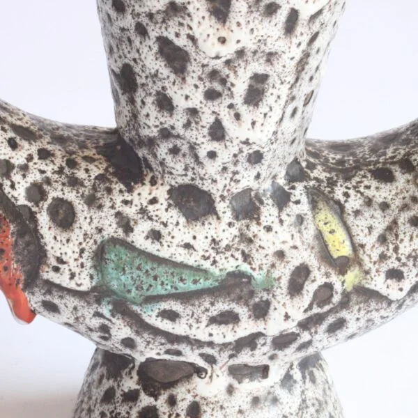 A very 1950s vintage organic shaped vase or pitcher by Marius Bessone, Vallauris 1950s. In a white / black lava glaze with geometric figures in green, red, yellow and blue mid century modern | Century Soup |