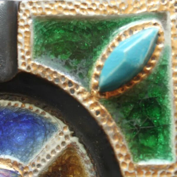 Vintage art deco square stoneware ashtray in gres de guerin with blue gemstones in the corners crackle glass inlays in blue, green and yellow. In the middle sits a large purple ceramic "gemstone". Very medieval magical forest fairy tale vibes. Century Soup vintage design.