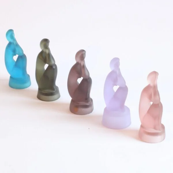 A set of "Centrepiece Lady" statues designed by Jitka Forejtova for Rudolfova - Sklo Union, Czechoslovakia 1959. Stylized bohemian press glass sculptures of a nude woman sitting | Century Soup |