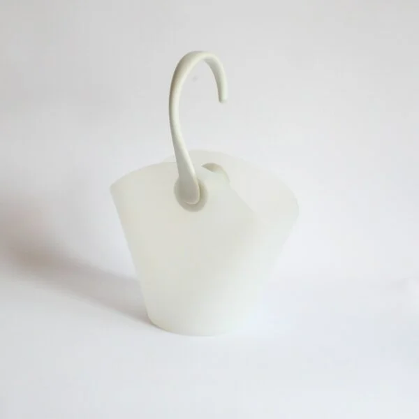 Alessi Chiringuito champagne or wine bottle bucket cooler that hangs from the side of the table. Designed by Ron Arad and Alberto Gozzi for Alessi in 2004. In a white thermoplastic resin. A chiringuito is a typical Spanish semi temporary beach or riverside restaurant or bar. Century soup vintage design antiques curiosa collectibles antwerp.