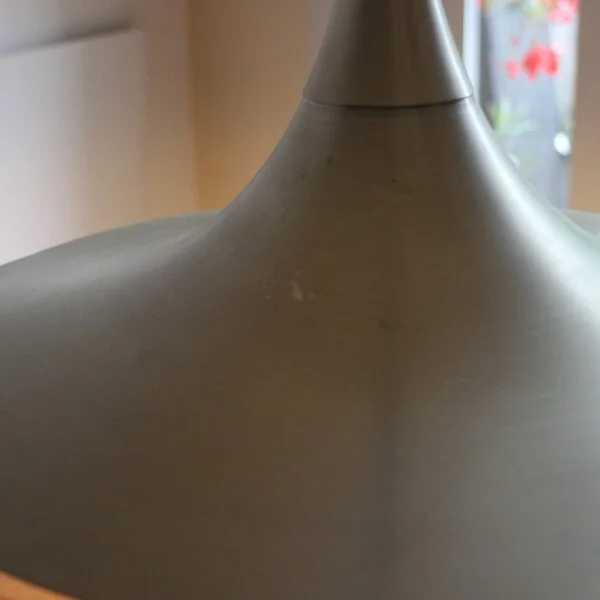 A vintage aluminum pendant lamp or ceiling light in the shape of a witches hat. Vintage Scandinavian style influenced design, probably a Belgian or Dutch manufactered model. Century soup vintage design antiques curiosa collectibles antwerp.