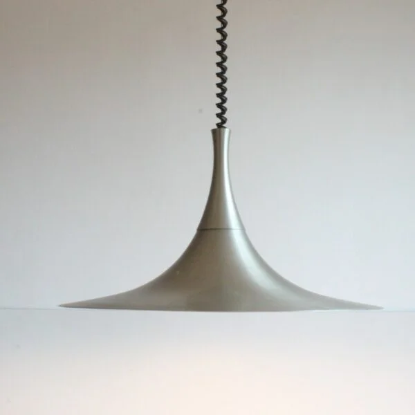 A vintage aluminum pendant lamp or ceiling light in the shape of a witches hat. Vintage Scandinavian style influenced design, probably a Belgian or Dutch manufactered model. Century soup vintage design antiques curiosa collectibles antwerp.
