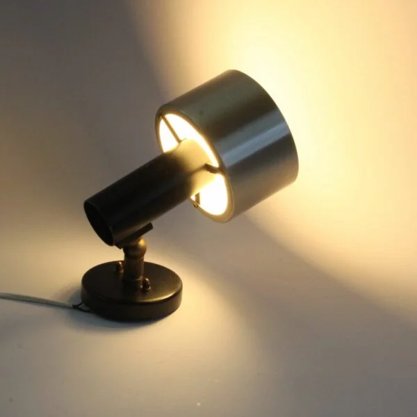Vintage mid century modern wall light or ceiling spot model ‘R-6 Form’ by Nico Kooy for Raak Amsterdam. Designed in the Netherlands in 1962. The lamp has a joint and can be aimed. Century soup vintage design antiques curiosa collectibles antwerp. Designed in the Netherlands in 1962. The lamp has a joint and can be aimed.