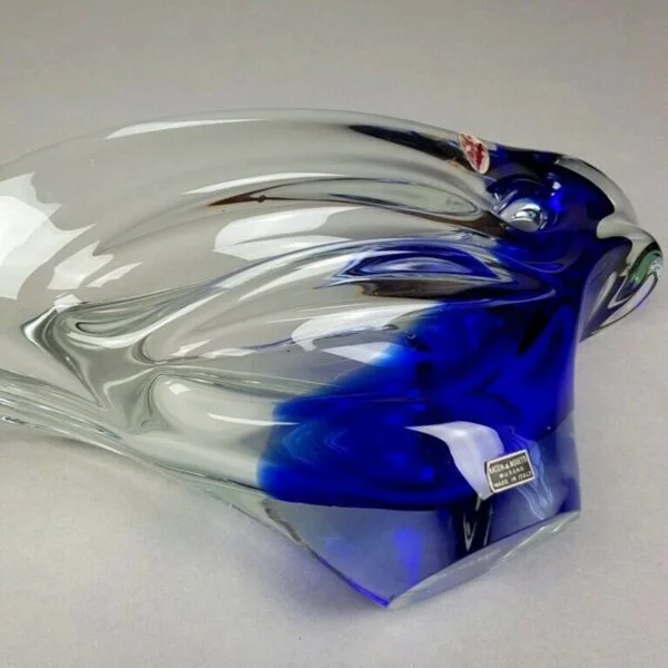 Vintage organic shaped freeform blue murano glass bowl or object with a hole by NasonMoretti, Venice, Italy 1970s. Clear and blue Murano glass. NasonMoretti was founded in 1923 by four brothers: Antonio, Giuseppe, Vincenzo and Umberto Nason. It is now led by the third generation of Nasons. Century soup vintage design antiques curiosa collectibles antwerp.