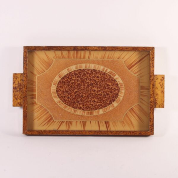 Art deco rectangular tray with an eglomisé painted glass surface and a painted wooden frame. The wood is painted with faux-bois patterns to resemble burlwood or root wood. Glass painted on underneath in typical art deco fashion, marquetry patterns in the middle and sunrays behind. Century soup vintage design antiques curiosa collectibles antwerp.