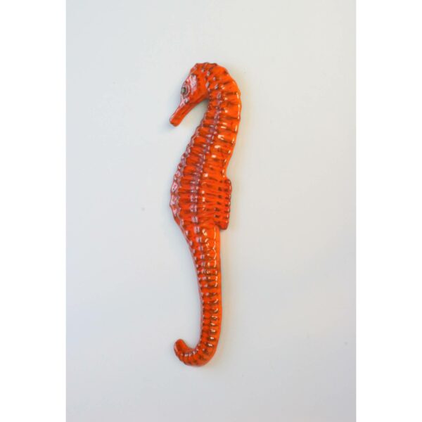 Vintage ceramic seahorse sculpture in an orange glaze. Loop on the back to hang on the wall. Signed underneath: F.Sanchez Made in Belgium in the 1960s 1970s, era Perignem / Amphora. Century soup vintage design antiques curiosa collectibles antwerp.
