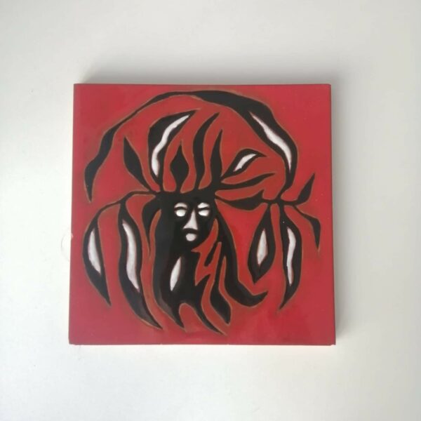 Vintage ceramic tile by Jean Lurçat, Sant Vicens, France. Made in the 1950s Mid century modern French ceramic tile depicting a black and white Dryad on an red glazed background.