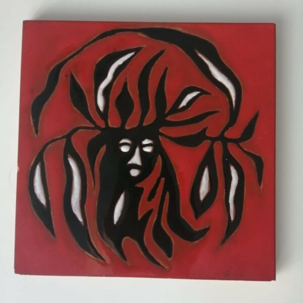 Vintage ceramic tile by Jean Lurçat, Sant Vicens, France. Made in the 1950s Mid century modern French ceramic tile depicting a black and white Dryad on an red glazed background.