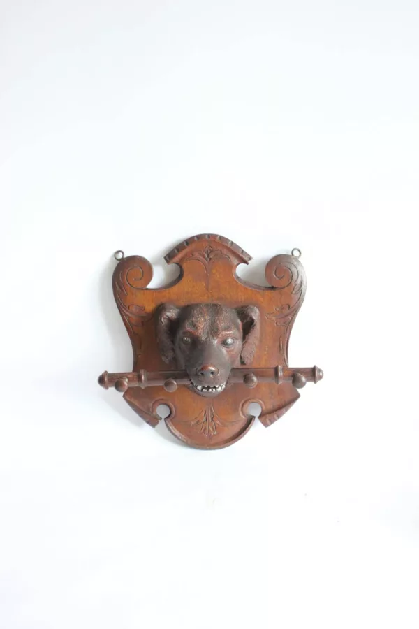 Black forest coat rack wood carving of a dog