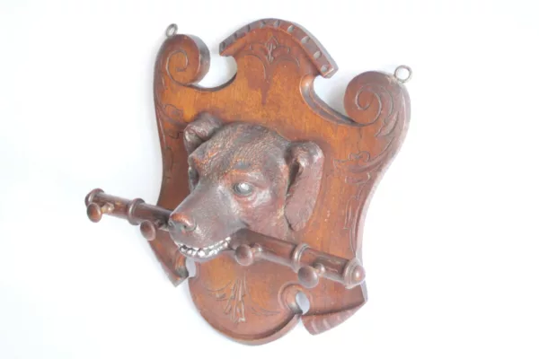 Black forest coat rack wood carving of a dog