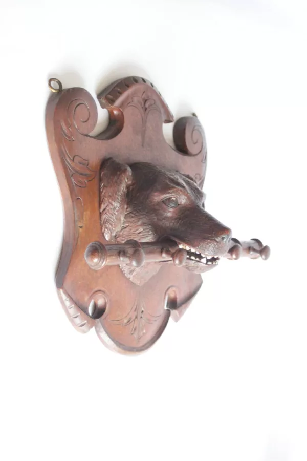 Black forest coat rack wood carving of a dog