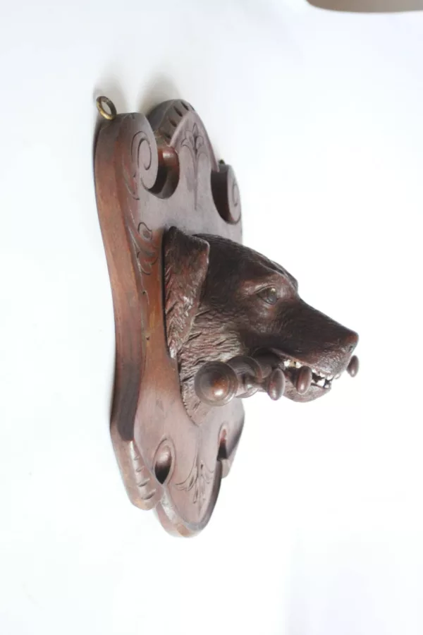 Black forest coat rack wood carving of a dog
