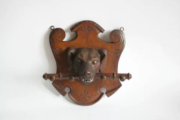 Black forest coat rack wood carving of a dog